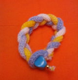Listing_armreifen_mit_blauem_knopf